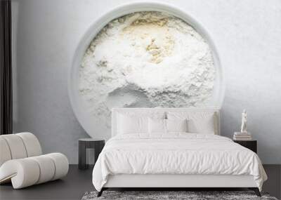 All purpose flour and vital wheat gluten in a ceramic bowl, process of making bread flour Wall mural