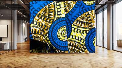 top view of blue ankara fabric, flatlay of nigerian wax cloth with designs, spread out blue ankara material Wall mural