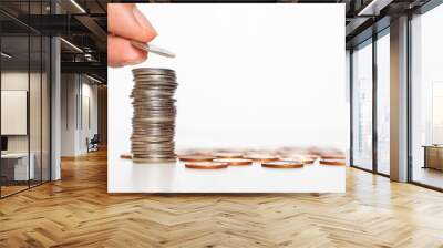 business man hand put silver coin stack growth up isolated on white background. money saving, financial growing, business startup, economy budget and investment concept. Wall mural