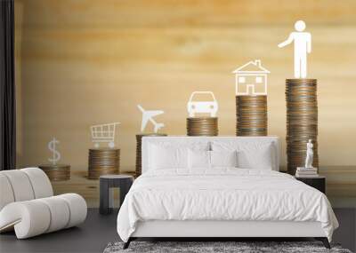 coin stacking on wood table with money, shopping, travel, car, home and people symbol concept target saving planning for long future. Wall mural