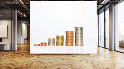 copper silver and golden coin many rate stack row growing pile on white background for money saving and investment business financial and banking concept. Wall mural