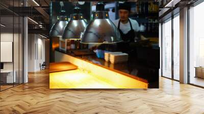 food lamp use for warm food,chef working in kitchen ,blurred pic Wall mural