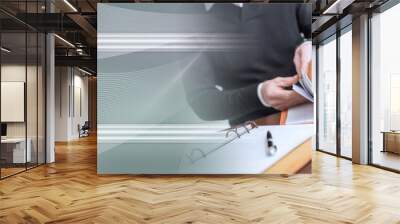 Businessman looking for document in folder; panoramic banner Wall mural