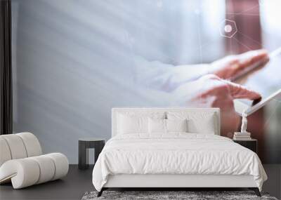 Businessman with tablet, hard light effect, double exposure; panoramic banner Wall mural