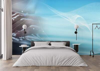 Hands using a laptop, hard light effect, overlayed with graphs. panoramic banner Wall mural