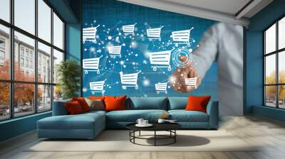 Man touching an e-shopping concept Wall mural