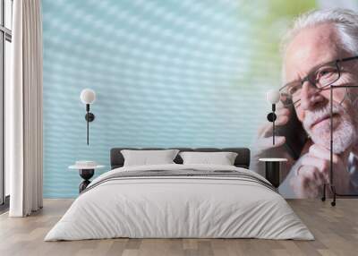 Senior businessman talking on mobile phone, light effect; panoramic banner Wall mural