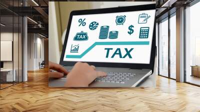 Tax concept on a laptop screen Wall mural