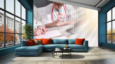 Two doctors discussing about medical results; multiple exposure Wall mural