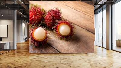 Fresh Rambutan Fruit on Wooden Background Wall mural