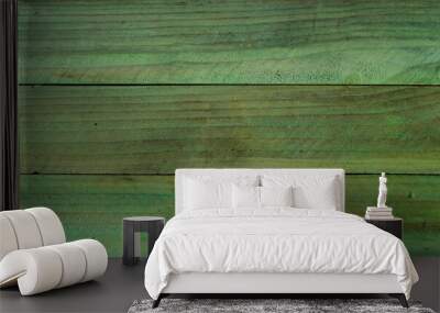 Grungy green wooden boards with rough texture as background Wall mural