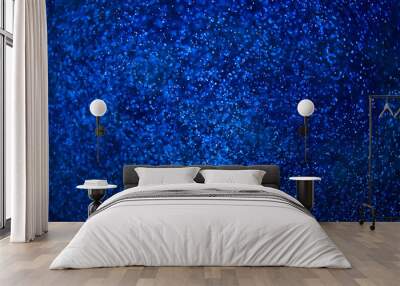 Abstract dark blue background of water and small bubbles bokeh Wall mural