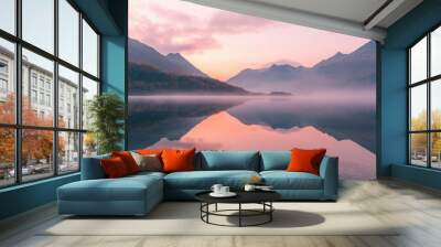 Nature in harmony: the sunrise reflecting in the calm waters of a mountain lake, illuminating the surrounding peaks Wall mural