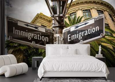 Street Sign Emigration versus Immigration Wall mural