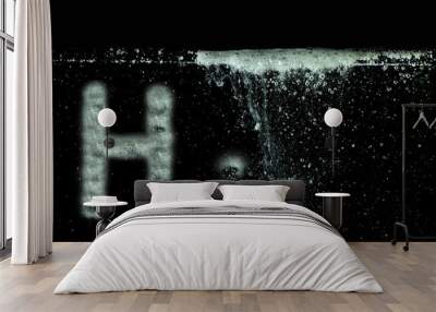 h2 hydrogen letters and many little bubbles in black water Wall mural