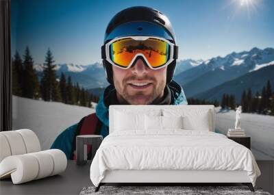 Portrait of a skier wearing googles after a fun day of skiing. Wall mural