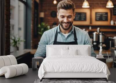 Portrait of happy caucasian male barista using tablet in cafe. cafe, free time and city concept. Wall mural