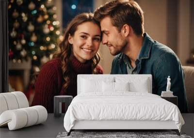 young couple having romantic date on christmas eve Wall mural