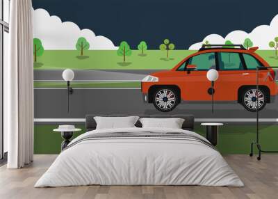 Driving man in personnel car orange color.  Drive on the asphalt road alone with turn light at night. Environment of green meadow and trees. Wall mural