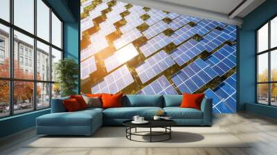 Top view of solar panels (solar cell) in solar farm with green tree and sun lighting reflect .Photovoltaic plant field. Wall mural