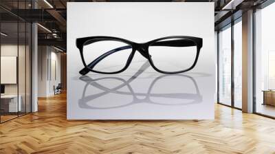 Black frame eye glasses on white background Wall mural