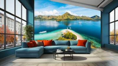 Top view of 'Kelor Island' in an afternoon before sunset with turquoise sea and tourist boats, Komodo Island (Komodo National Park), Labuan Bajo, Flores, Indonesia Wall mural