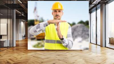 Architect or engineer making time out pause break gesture. Wall mural