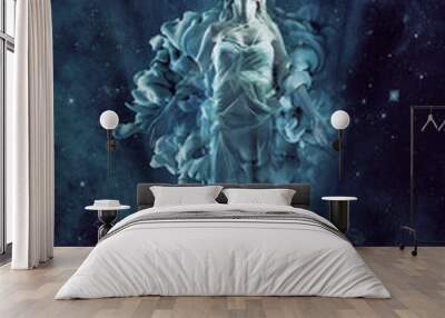 We are all made of stardust. Illustration of a ethereal woman floating in the night sky. Wall mural