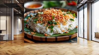 A captivating side-angle shot of a plate of Xoi served on a traditional banana leaf, featuring sticky rice topped with fried shallots, pork floss, and mung beans. Wall mural