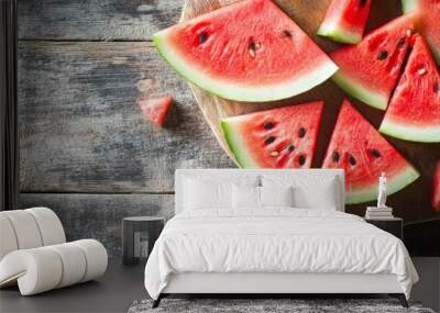 Slices of watermelon on rustic wood. Wall mural