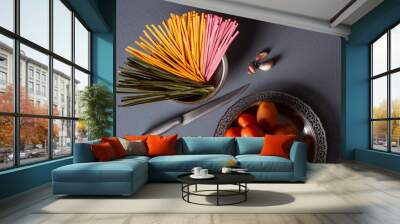 Colorful noodles on a white plate Wall mural