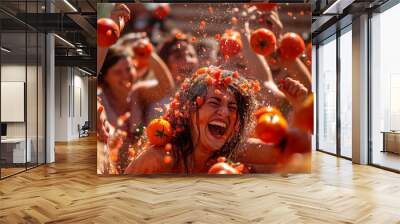 People enjoying La Tomatina festival with tomatoes thrown everywhere. Wall mural