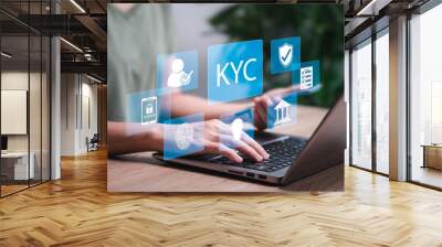 KCY, Know your customer concept, Women use laptops to verify the identity of clients authentication for the KYC system, Verifying the identity of clients for KYC financial clients, Advanced security Wall mural