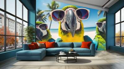 Three parrots in sunglasses against beach backdrop - A humorous depiction of parrots with sunglasses in front of a serene beach, merging nature with style Wall mural