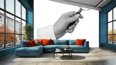 Black and white hand in a white shirt holds a magnifying glass isolated on transparent background - element for collage Wall mural