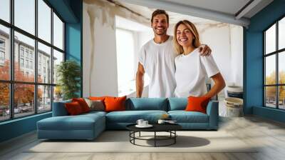 Young happy couple during repair new apartment. AI generated Wall mural