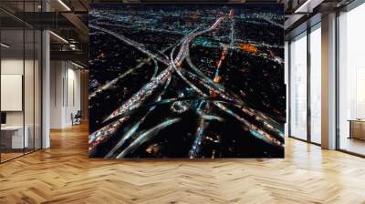 Aerial view of a massive highway in Los Angeles, CA at night Wall mural