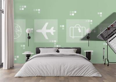 Airplane travel theme with person using a laptop computer Wall mural