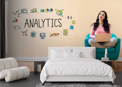 Analytics with young woman using a laptop computer Wall mural