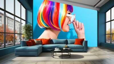 Beautiful woman in a colorful wig Wall mural