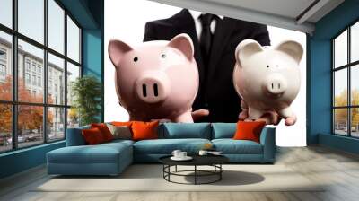 Businessman holding two piggy banks on a white background Wall mural