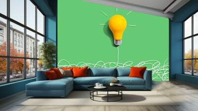 Clarifying complex ideas theme with light bulb - Flat lay Wall mural