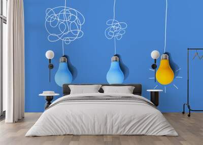 Clarifying complex ideas through the glow of lightbulbs - Flat lay Wall mural