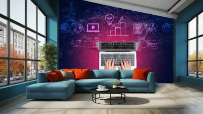 Content marketing concept with person using a laptop computer Wall mural