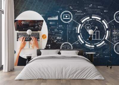 Content marketing concept with person using a laptop on a white table Wall mural