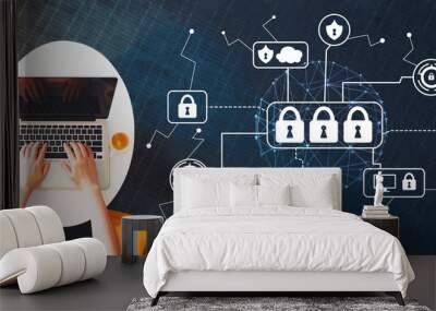 Cyber security with person using a laptop on a white table Wall mural