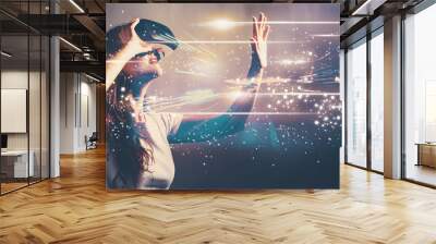 Digital Screen with young woman using a virtual reality headset Wall mural