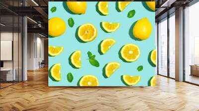 Fresh lemon pattern on a bright color background flat lay Wall mural