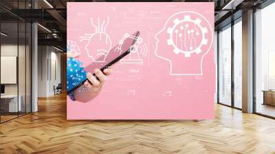 Future technology concept with young woman using a tablet computer Wall mural