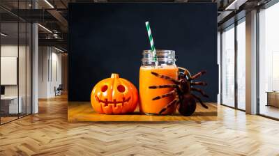 Halloween pumpkin with carrot juice in masons jar Wall mural